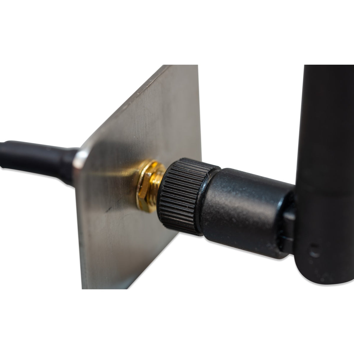 Victron Outdoor LTE-M wall-mount antenna — close-up of the brass bulkhead nut clamping the bracket plate