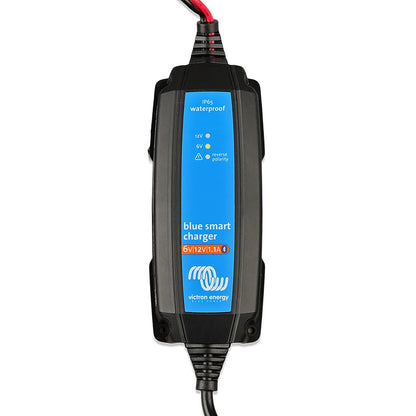 Victron Blue Smart IP65 battery charger 6V/12V-1.1A, top view of the blue and black waterproof case showing the 12V, 6V and reverse polarity indicator LEDs and the Bluetooth model marking