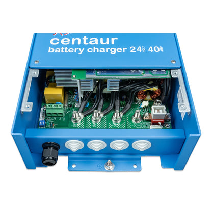 Victron Centaur Charger 24V 40A — close-up of PCB terminals: three +DC, one -DC, AC in and DIP switches
