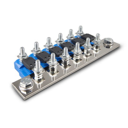 Victron CIP100400070 busbar, 1500 A, angled left view stacked on six blue modular MEGA fuse holders with black insulating covers; fuse holders sold separately